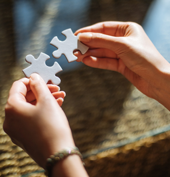 A professional female hand is shown against a white background, symbolizing the concept of a business connection.